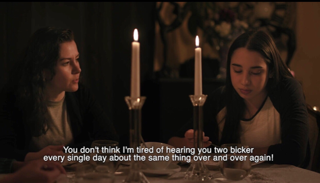 Candlelit dinner scene from "La Santera" short film